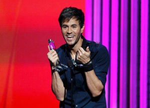 Enrique Iglesias accepts two out of nine awards at the 2015 Billboard Latin Music Awards with his casual charm
