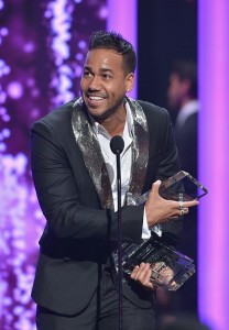 Romeo Santos takes home two out of ten awards at the 2015 Billboard Latin Music Awards looking all spiffy and stuff